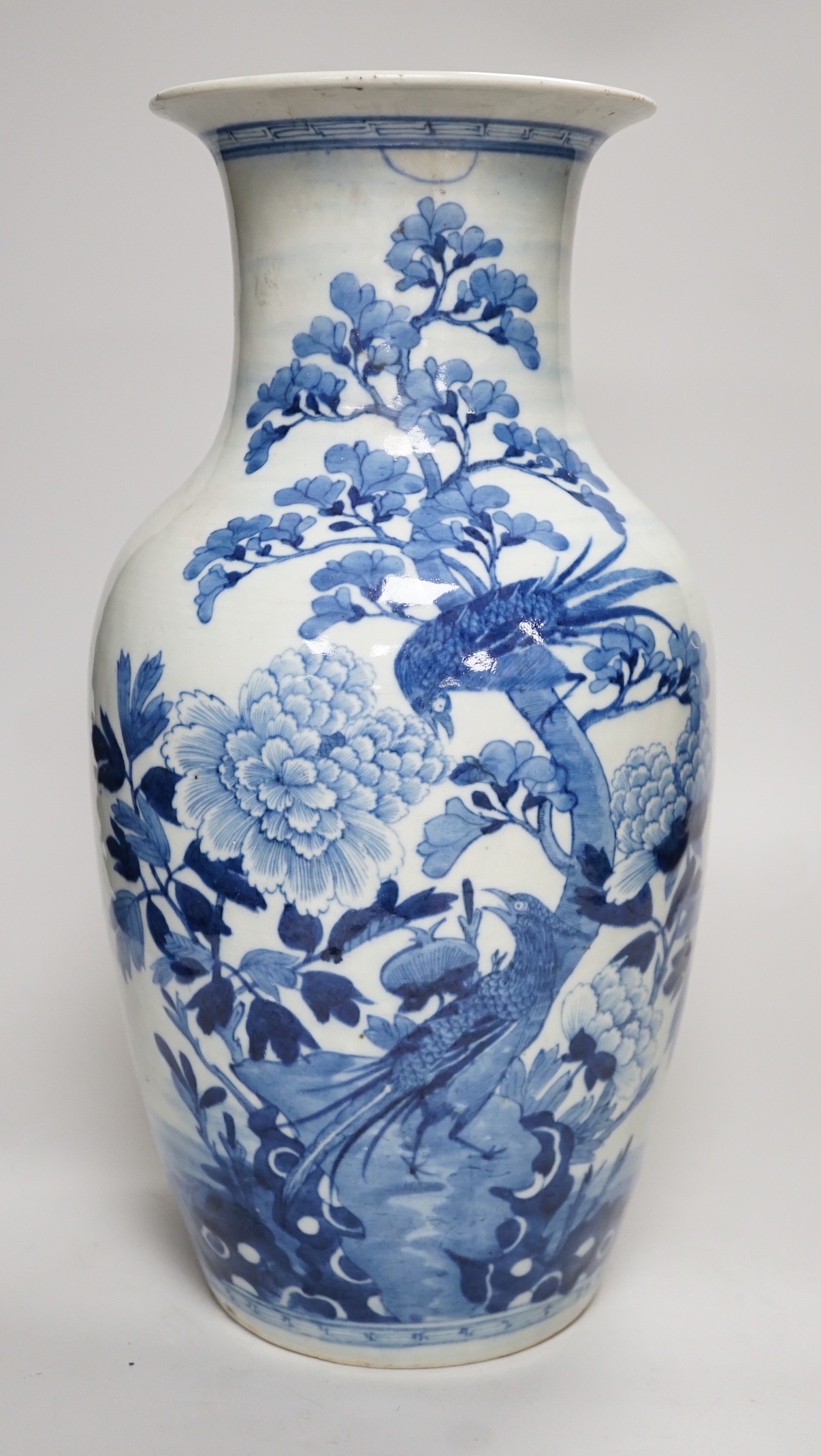 A large Chinese blue and white vase, blossoms, peaches and birds, 37cm